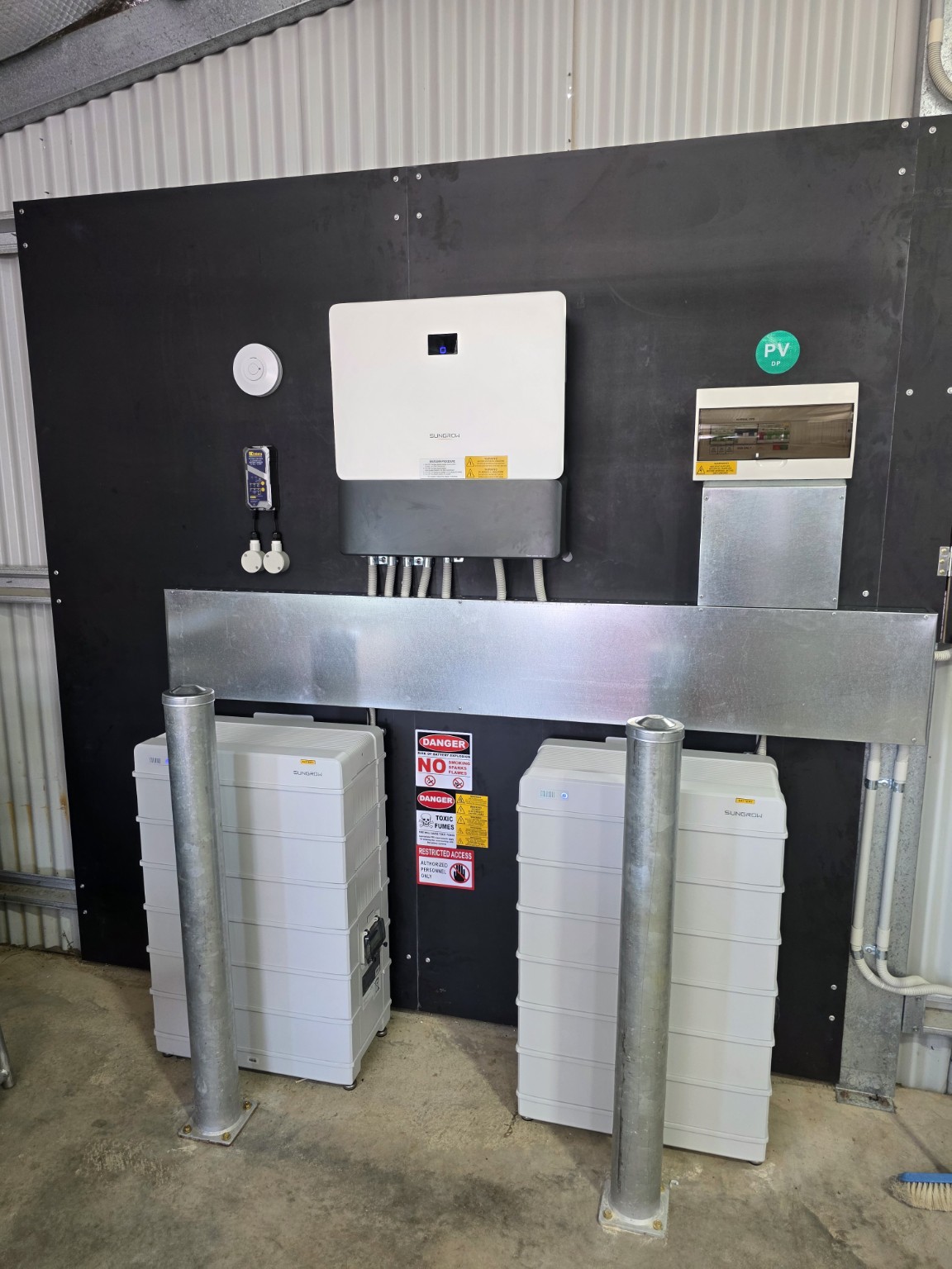Dual commercial battery installation with inverter and electrical protection
