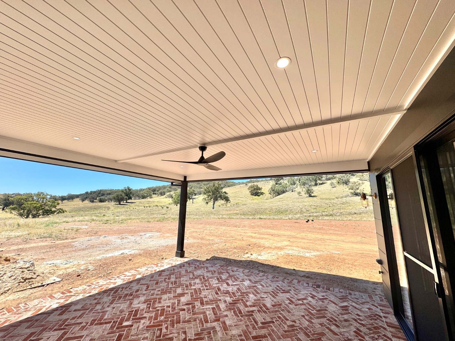Alfresco ceiling lights and fan installed at a regional home