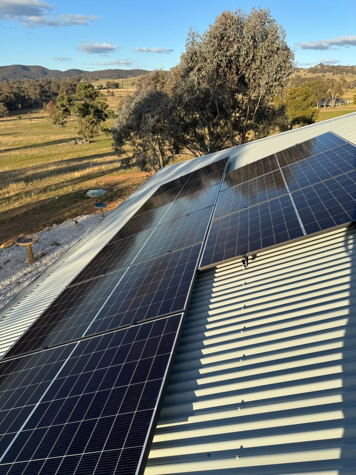Solar panel installation overlooking a rural Mudgee landscape