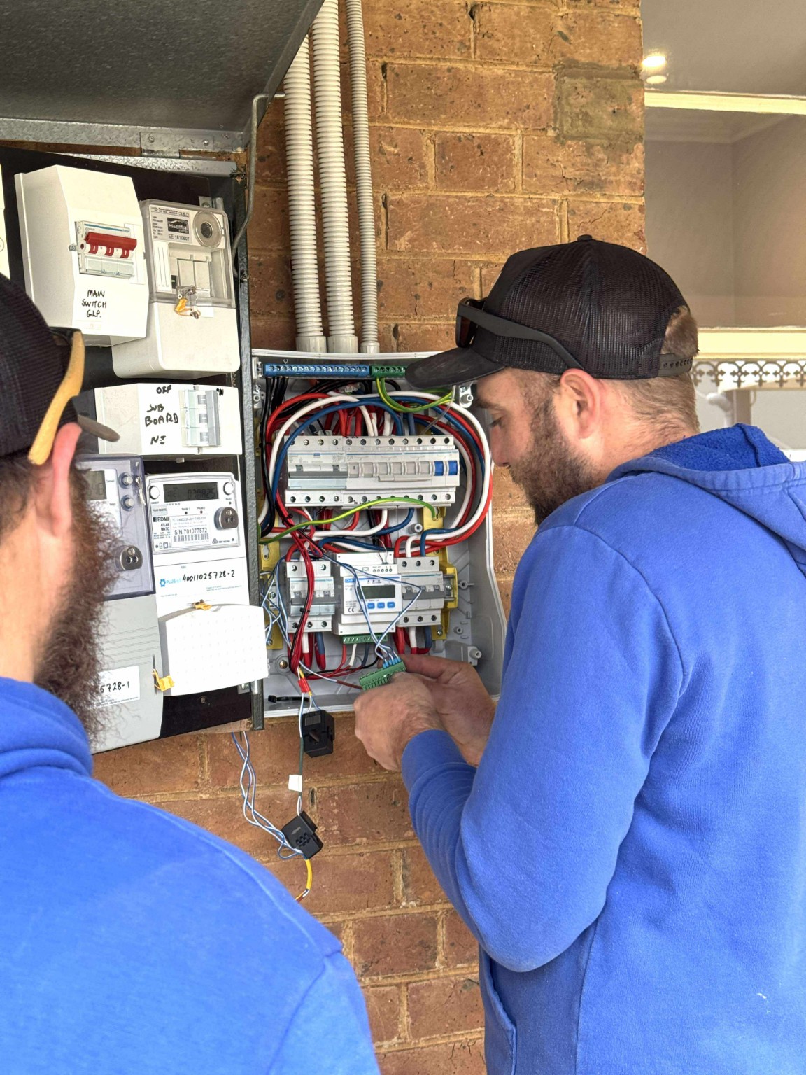 Swebs electricians completing a residential switchboard upgrade